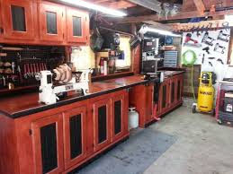 It is indeed a good idea to build it that way because the wall will partly provide some support. Garage Workbench Finewoodworking