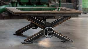Stylish designer coffee table, industrial antiques, steam punk the coffee tabletop is made from a 19th century clocking in clock, the dey howard brothers time register, the cloc. The Steampunk Coffee Table Steel Vintage