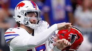 Josh Allen injury: Bills quarterback holds arm in pain against Falcons