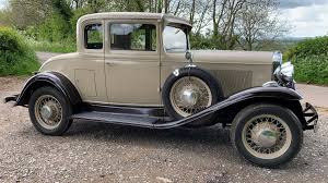 Image result for Caramel Brown 1931 Oldsmobile