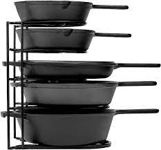 Possibly iron pan without cast does not refer to cheap pressed iron which needs to be coated, but to a wrought iron pan, which can, as cast iron, be used then i worked in vegetable oil into the skillet and placed it upside down in a 375°f oven on the oven's middle oven rack for about an hour and then. Amazon Com Heavy Duty Pan Organizer 5 Tier Rack Holds Up To 50 Lb Holds Cast Iron Skillets Griddles And Shallow Pots Durable Steel Construction Space Saving Kitchen Storage