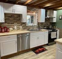 Green kitchen design with Thai Basil paint color