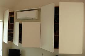 The lid should rest securely within these hooks and you'll be able to grab it when you need it. Best Living Room Decorating Ideas Designs Ideas Hanging Cabinet Design For Room