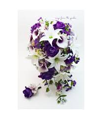 This beautiful galaxy orchid bouquet is made with artificial real touch white casablanca lilies, hand painted galaxy orchids, real touch picasso calla lilies, and blue hydrangeas. Cascade Wedding Bouquet With Picasso Callas Real Touch Purple Roses Tiger Lilies Lavender Hydrangea