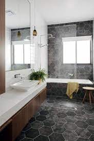 We would all love to bring the hotel bathroom back with us from holidays, a pristine, well worked out space that we can luxuriate in and spend time porcelain or ceramic tiles are ideal choices because they are easy to maintain, are moisture resistant and highly durable. The Top 100 Bathroom Floor Tile Ideas Bathroom Design Ideas
