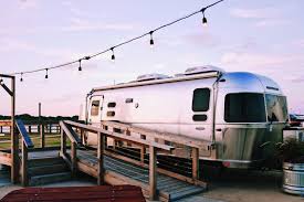 Fully equipped with a double bed, a kitchen, living area, and even a claw foot tub, this kitschy vacation getaway find an airstream for rent near you on airbnb. Enjoy An Airstream Getaway At Matagorda Bay Nature Park Texas