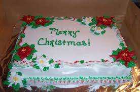 The christmas cake is designed to look like a christmas tree complete with a mistletoe and christmas balls hanging around the tree. Christmas Cake Christmas Sheet Cakes Christmas Cake Designs Fall Theme Cakes