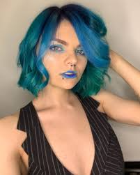 Help us settle a debate, is it Gemini hair or split dye? Hair by  @tk.colorss (she/her) ❤️🤍 #PulpRiot is the paint. 🎨 Shades used: Shag Rug  + Pyro + Fly Trap