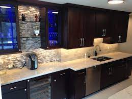 Designer Caroline Freeda Used Fieldstone Cabinetry S Tempe Door Style In Maple Finished In Mocha Wit Kitchen Cabinets In Bathroom Custom Kitchen Black Kitchens