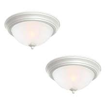 Follow the manufacturer's instructions and install the dome or shade covering, connecting it to the base of the fixture. Commercial Electric 13 In 2 Light White Flush Mount With Frosted Glass Shade 2 Pack Efg8012a Wh The Home Depot