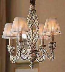 Evlerimizde Dekoratif Acilardan Farkli Bir Cok Avize Modelini Tercih Ederiz Zevkimizi Yansitacagimiz Tasarimlarimizi Bel Crystal Chandelier Chandelier Lighting