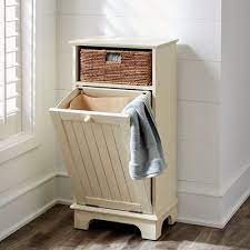 Storage Doesn T Have To Be Stark Our Handsome Wood Cabinet Features One Hand Woven Banana Leaf Basket And Laundry Hamper Bathroom Storage Laundry Room Hamper 40 x 30 x 95cm approx 1,796 cabinet laundry hamper products are offered for sale by suppliers on alibaba.com, of which laundry bags & baskets accounts for 3%.