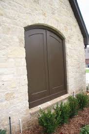 Remember the shutter dogs when installing a faux window so that the shutters can be held open, and the slide bolts to hold the shutters closed! Faux Window Like This Or Straight With Some Sort Of Horizontal Embellishment Fake Window Shutters Exterior Faux Window