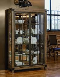 What is a curio cabinet? Metalworks Bunching Display Cabinet In Oak Legacy Classic Furniture Home Gallery Stores Glass Curio Cabinets Furniture China Cabinet