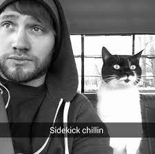 What is the price of a basic haircut at Andrew's or Dark Horse barber shops?