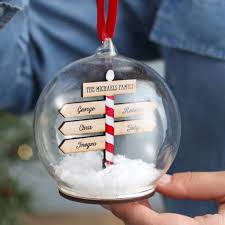 We love bubble shooters because sometimes it's the only place to find a some order. Personalised Family Christmas Sign Post Bauble By No Ordinary Gift Notonthehighstreet Com