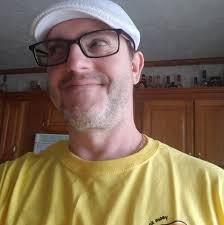 What disc is suitable for a right-handed backhand thrower looking for more  stability and less flip in headwinds?