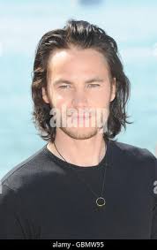 Taylor Kitsch, während einer Fotoaufnahme für den Film, den Bang Bang Club,  am Strand von Gray D'Albion in Cannes, Frankreich, im Rahmen des 62.  Jährlichen Filmfestivals von Cannes Stockfotografie