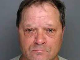 Sanford man charged with embezzling from Moore real estate office