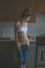 Deze selectie iconische jacks en jassen voor dames vormt een nieuwe. Photo Woman Wearing White Calvin Klein Brassiere And Pantie Holding A Water Glass In Kitchen Free Stock Photo