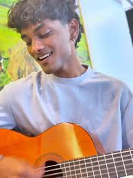 Isaac Timothy and Raini Singing Couch