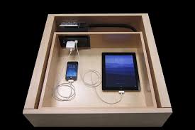 Manufacturing and selling cell phone charging stations, docks and lockers. The Docking Drawer Lets Installers Turn A Drawer Into A Hidden Charging Station For Mobile Devices Electrical Outlets Kitchen Drawers Electricity
