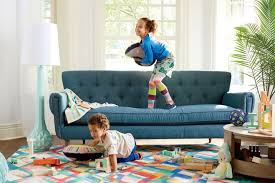 Instead of the usual onslaught of plastic and flashing lights, these objects are made from natural materials, like wool or unpainted wood , and are meant to spark a child's imagination, prompting. Creating A Kid Friendly Living Room Archute