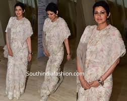 Sun lover, nature seeker, yoga doing, fitness enthusiast, dancing and singing, kissing babies, choosing joy. Sonali Bendre In Anavila South India Fashion