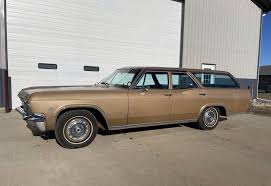 Image result for Sierra Tan 1965 Chevy II