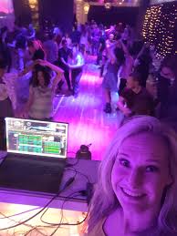 Night at with packed floor and dancing