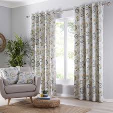 Its heathered design is made from polyester, and it features a geometric block pattern in crisp hues of blue and gray for a fresh look in the living room or bedroom. Charleston Teal Eyelet Curtains Lined Flower Closs Hamblin