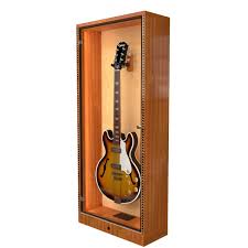 A responsible manufacturer will build guitars in a controlled environment to avoid the guitar suffering when it finds. The Showcase Deluxe Guitar Display Cabinet