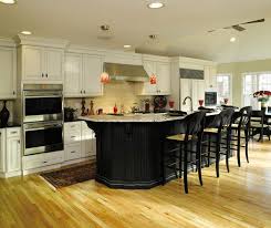 Providing a neutral backdrop, white kitchen like a little black dress, white kitchen cabinets are appropriate almost anywhere, whether your space is warm up white. Off White Cabinets With Black Kitchen Island Decora