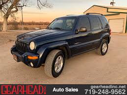 Image result for Patriot Blue 2003 Jeep