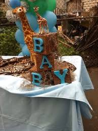 These giraffe baby shower centerpieces are a very unique way to decorate your tables. 48 Baby Shower Giraffe Ideas Baby Shower Giraffe Baby Shower Giraffe