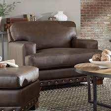 With oversized and padded arms, a spacious seat and a beautiful line of brushed platinum at the base, the laguna ridge chair and a half brings elegance to any home. Craftmaster L782750 Contemporary Leather Chair And A Half With Oversized Nailheads Bullard Furniture Chair A Half