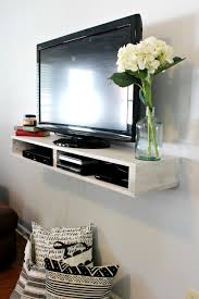 This tv console can also serve as a floating bathroom vanity. Diy Floating Tv Shelf
