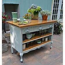 You can convert this easily into an efficient kitchen island and make it look like it was made for that purpose. Fabulous Diy Farmhouse Kitchen Islands The Cottage Market Diy Kitchen Island Repurposed Furniture Furniture