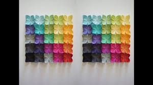 Origami flowers can be really beautiful. Origami Diy Paper Lotus Flower Wall Art Origami Wall Hanging Paper Craft Room Decor Tutorial Yo Origami Wall Art Paper Wall Art Diy Geometric Origami