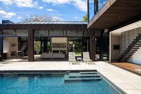A pool house design presents bathers a location to change, clean up, and get a snack as well as a drink. Godden Cres By Dorrington Architects Associates Pool House Designs Architecture Pool Patio Designs