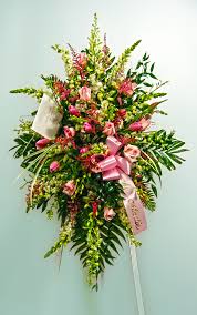 Deluxe and premium sizes include beautiful white asiatic lilies, the regular size does not. Standing Easel Spray Make With Snapdragons Roses Tulips And Lilies Funeral Flower Arrangements Funeral Flowers Memorial Flowers