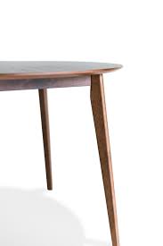 It features a square top with drop leaves that tuck away. Alia Mid Century Modern Round Dining Table Small Kitchen Table Walnut Edloe Finch Furniture Co