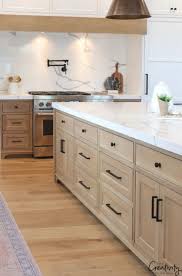 Beautiful Transitional Modern Farmhouse Kitchen With White Oak Cabinetry Flooring And Clean Marble Home Decor Kitchen New Kitchen Cabinets Kitchen Renovation