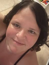 Julie Wernersbach with our easter dinosaur. Bunnies don't lay eggs;  dinosaurs did lay eggs. Ergo—