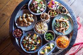 Hummus, variety of toppings, israeli salads, pita alternative menu option: Our Guide To The Top U S Restaurants That Serve Israeli Cuisine From The Grapevine