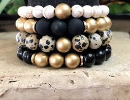 Black And Gold Bracelet Set Black Matte Stackable Bracelet Set Gold Bracelet Dalmatian Bracelet Marble Howlite Bracelet Matte Gold Bracelet In 2020 Matte Gold Bracelet Beaded Bracelets Gold Bead Bracelets