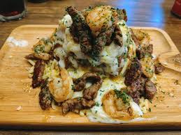 Poutine with beef, shrimp, cheese and garlic : rFoodPorn