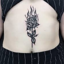 Rose And Flame Sternum Tattoo Tattoo Ideas And Inspiration Sternum Tattoo Sternum Tattoo Design Tattoo Designs