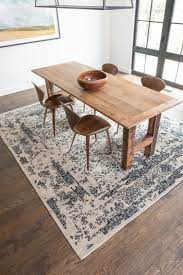 Sometimes the best thing you can put into a dark dining room is a light rug! Loloi Rugs The Beautiful Art Of Rug Making Design Milk Dining Room Decor Dining Room Inspiration Decor