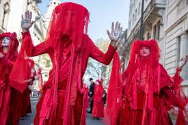 From our coverage of extinction rebellion activity around the world to commentary on climate change news and events, the extinction rebellion blog. The Meaning Behind Extinction Rebellion S Red Robed Protesters Dazed